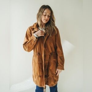 Super cool terra-cotta colored multi pocket coat